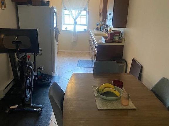 Dining room/ breakfast nook to kitchen (furnished)