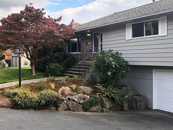 Side view of home coming up road