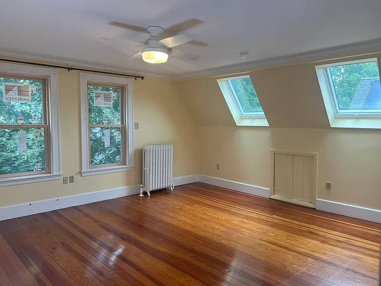 Primary bedroom with skylights and 2 closets.