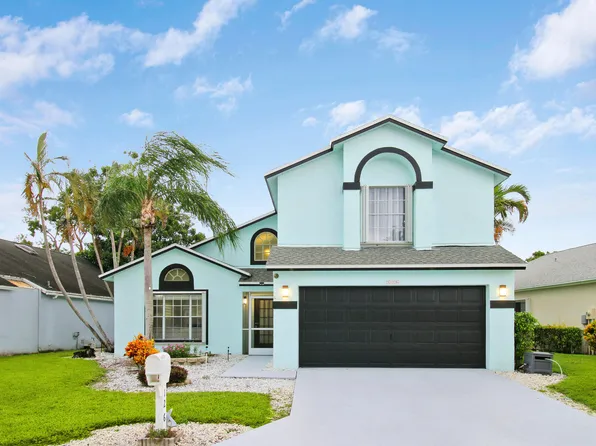 126 Hammocks Court, Greenacres, FL 33413