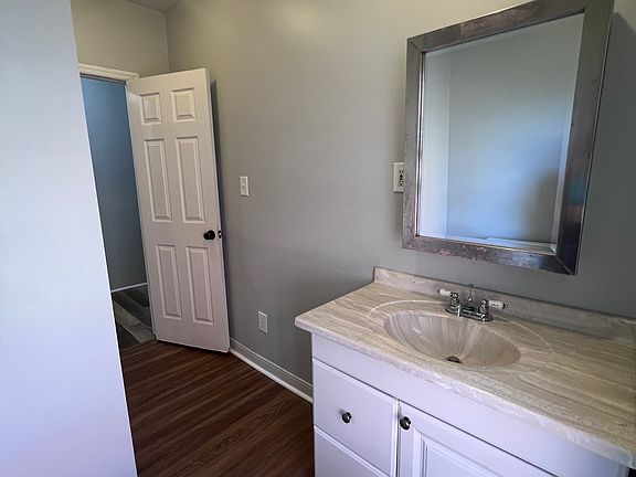 Full bathroom with tub