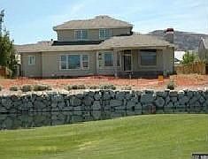 Back of house from fairway (looking over lake)