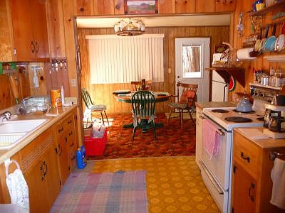 Walk through kitchen to dining