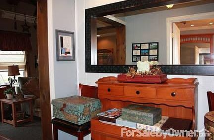 Family/Dining Room
						:
						Living area features vaulted ceilings and an abundance of natural light.