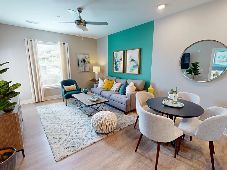 Gather, relax, or entertain _ this flexible living and dining space adapts to your lifestyle with ease and comfort.