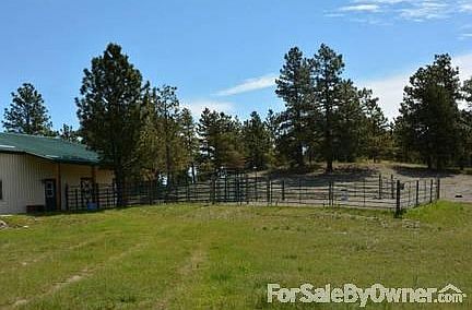 Back Yard
						:
						The back yard, looking toward the corrals.
