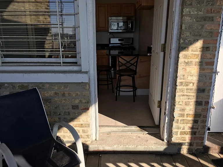 Entrance to kitchen off off porch