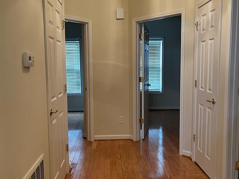 HALL TO GUEST BATH AND TWO BEDROOMS