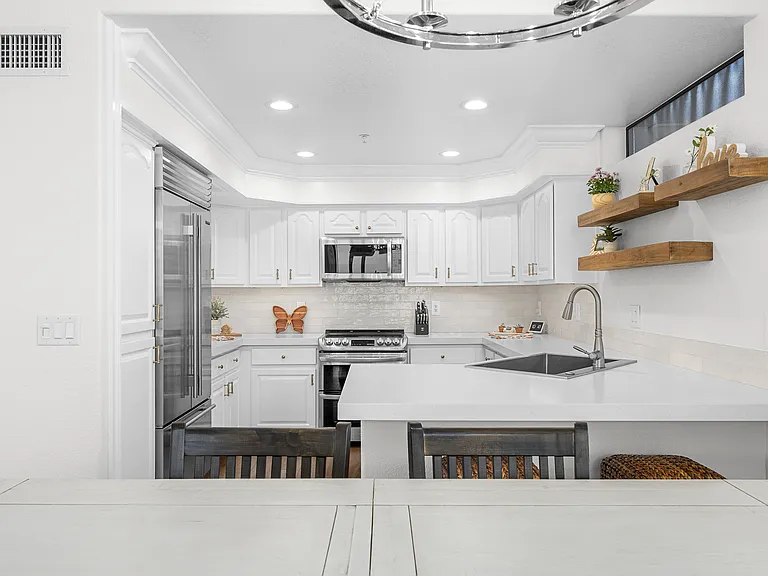 KITCHEN VIEW + BREAKFAST BAR