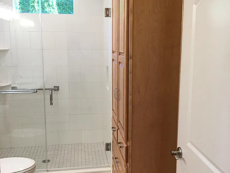 Bathroom showing solid maple cabinet.