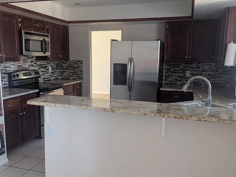 10233 La Paz Dr NW — Photo 2