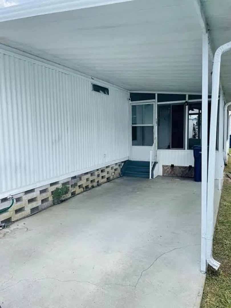 Home with Screened Lanai, Carport & Convenient In-Home Laundry — Photo 2