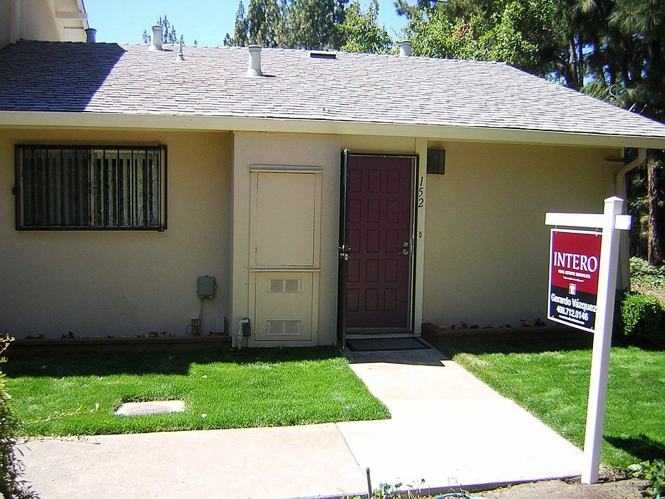 Front of the house faces toward foothills.