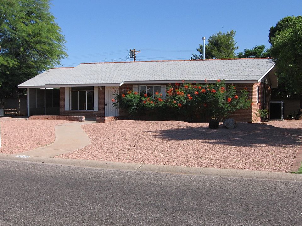 Beautiful red brick home with large front yard