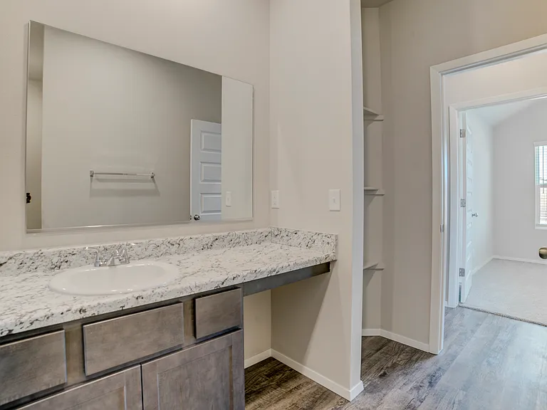 Another view from the bathroom that separates the bedrooms. Pictured to the right is the front two bedrooms (bedrooms 3 and 4).