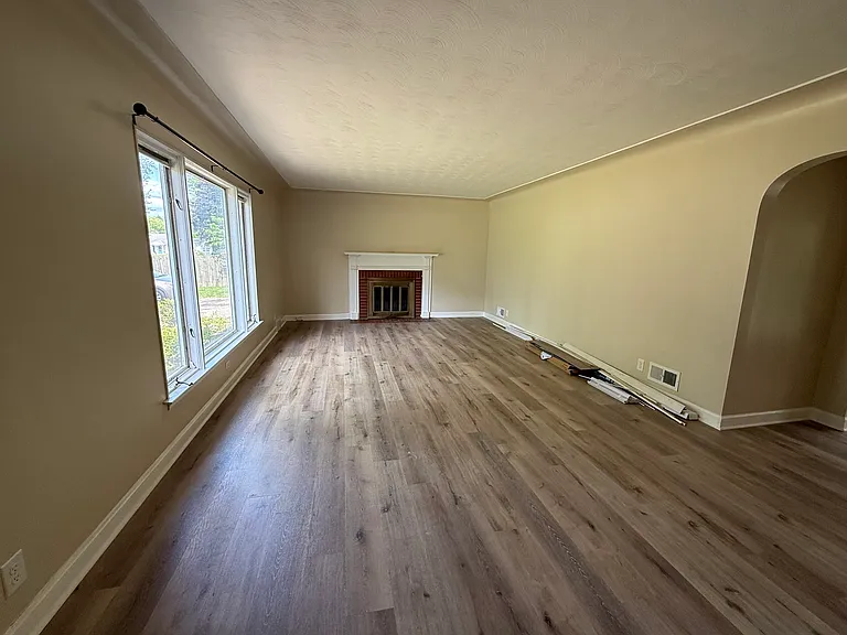 Living Room. Fireplace is just for decor. Non - working.