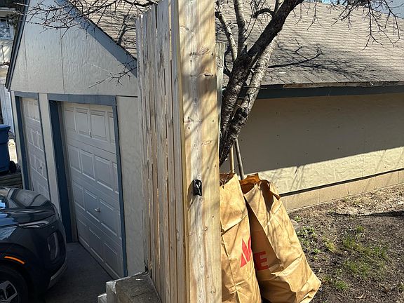 One covered private garage space (second space for other side is separated)