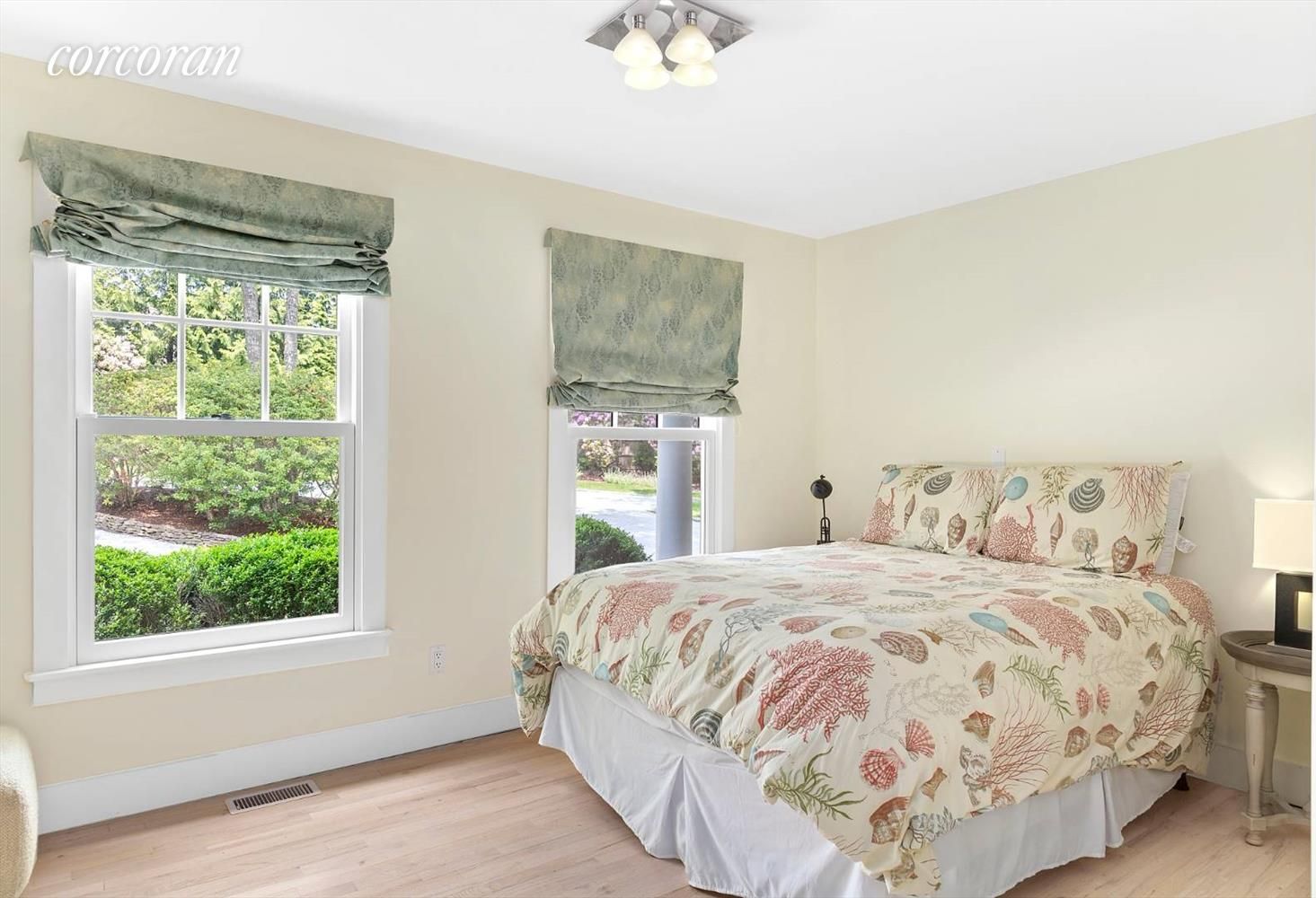  Ground floor bedroom with queen bed and garden view