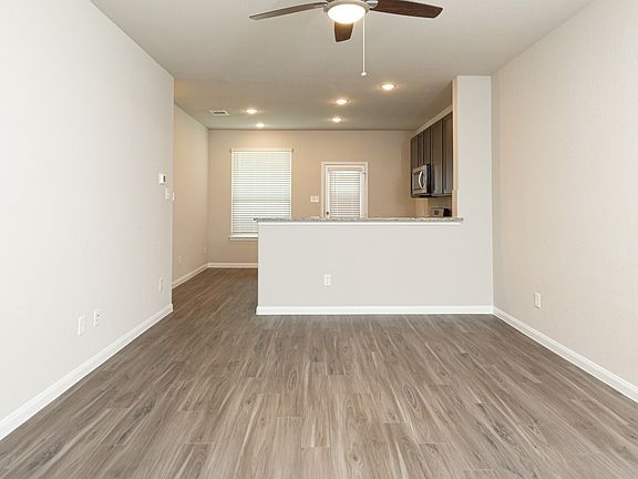Family Room to Kitchen and Dining Area