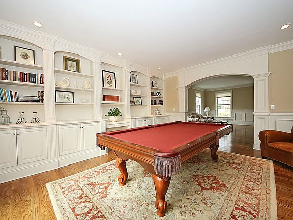 Library currently used as a billiards room