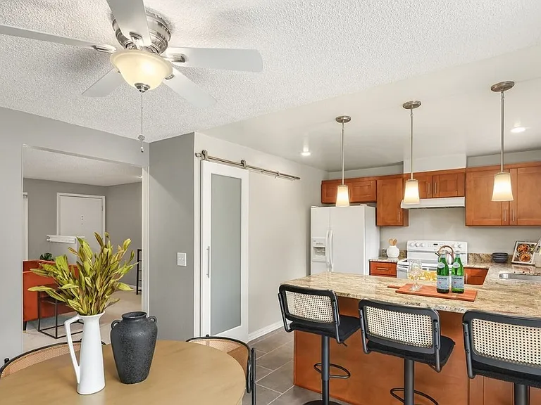 Dining Area and Full Counter Bar (Granite)