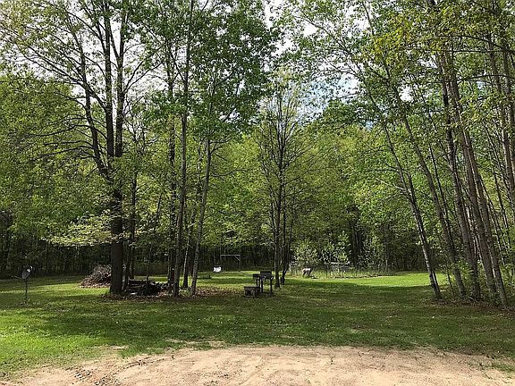 Lawn with garden, trees.