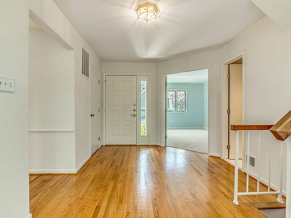 Spacious Entry Hall with study and half bath