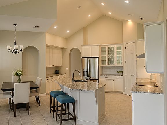 Gourmet Kitchen with stainless steel appliances & eat in kitchen.