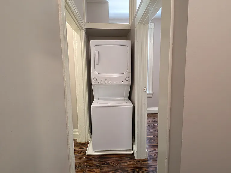 Washer and dryer in unit on second floor between the bedrooms.
