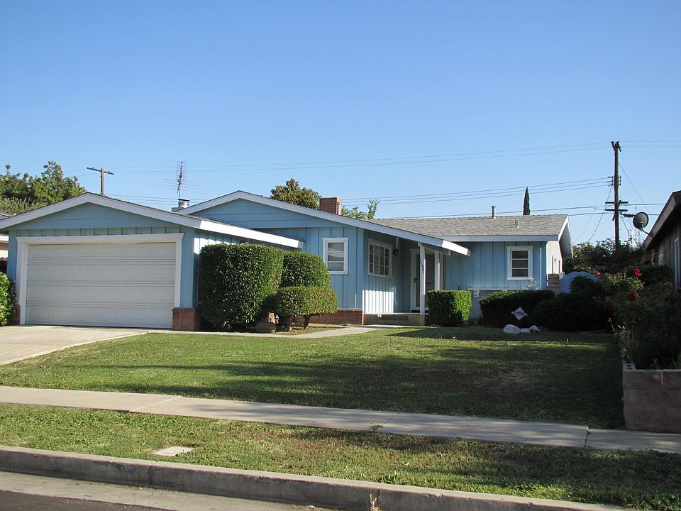 Front yard. 2-car remote-controlled garage, 2 more spots in front of the garage if needed, plus optional parking on the street.