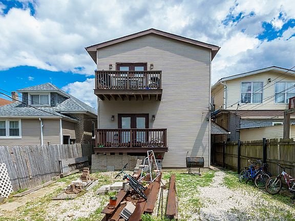 2 balconies and large fenced in yard