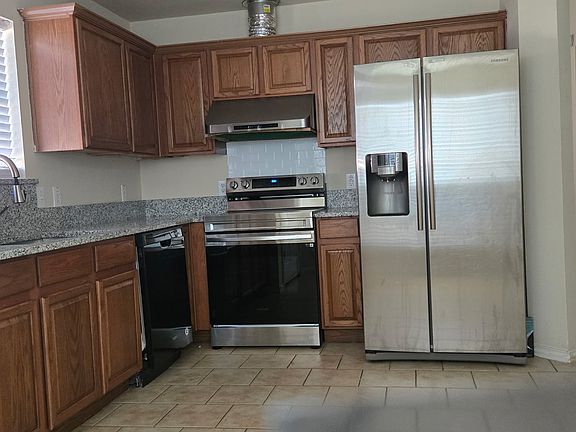 Kitchen with existing refrigerator