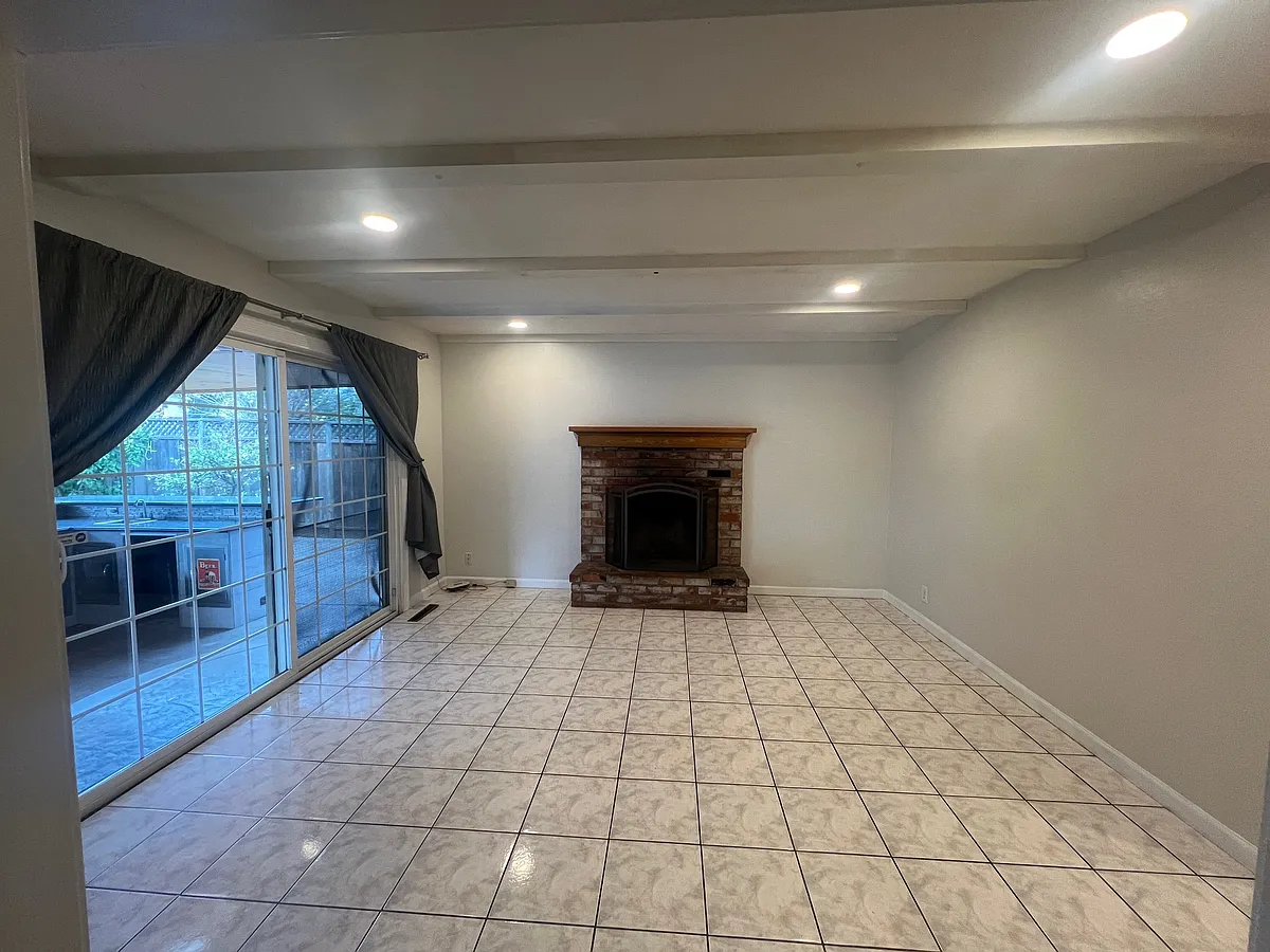 Dining room with wood burning fireplace. - 5391 Joseph Ln