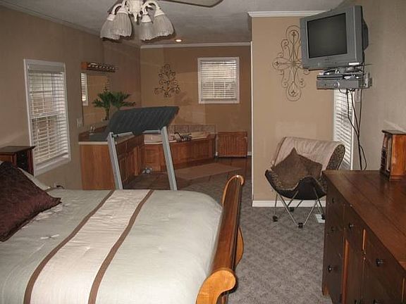 Master Bedroom with spa tub and extra large shower.