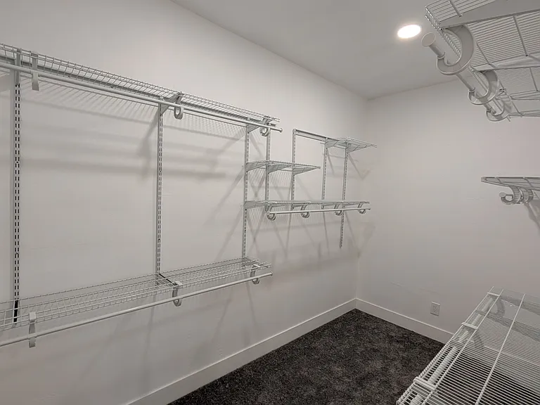 Walk in closet off master bathroom