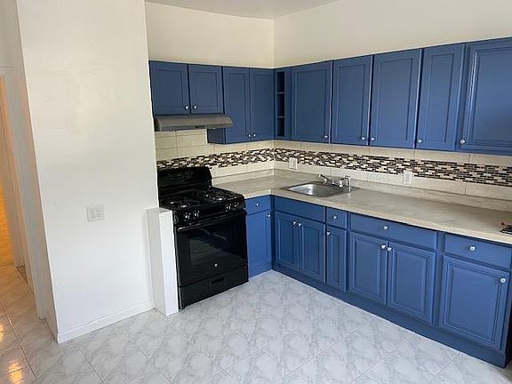 Large, newly redone kitchen with appliances and yard access