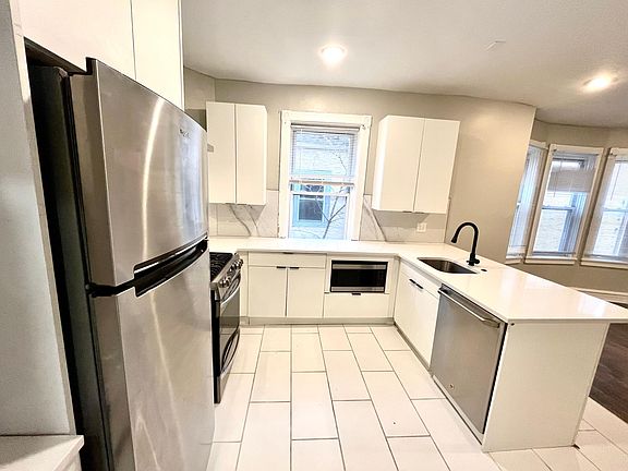 black faucet and black handles.