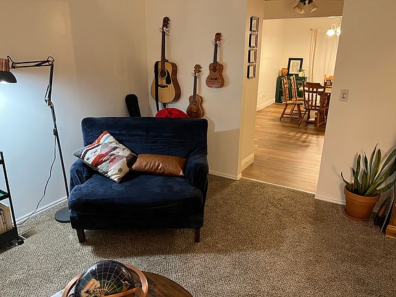 Living room view of dining area - example furnishings from previous tenant