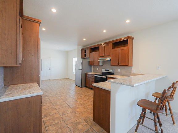 5th image of 13525 E 48th Dr