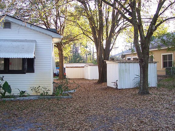 West side of property has 4 sheds