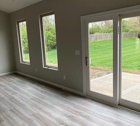 Large Windows with Screens and Blinds. Sliding Glass Door to Outdoor Patio
