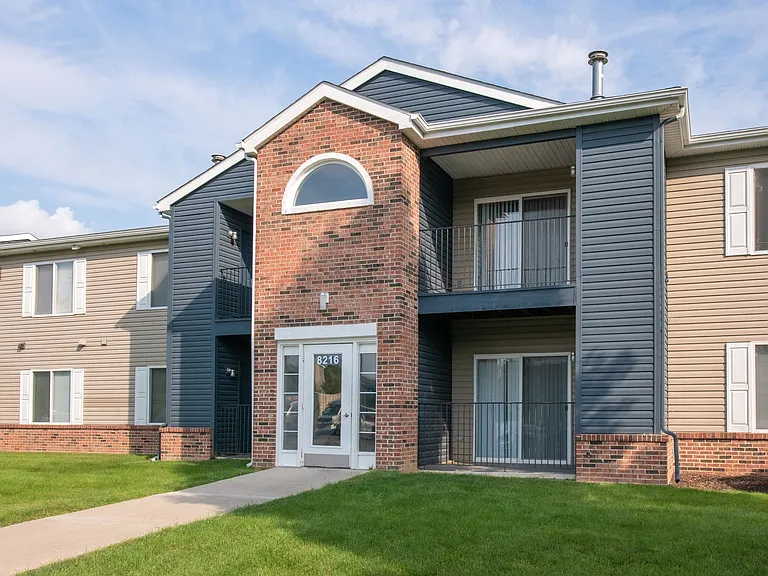 Stylish two-story buildings feature attractive brick archway entrances and contemporary design, professionally operated by Highlands Vista Group.