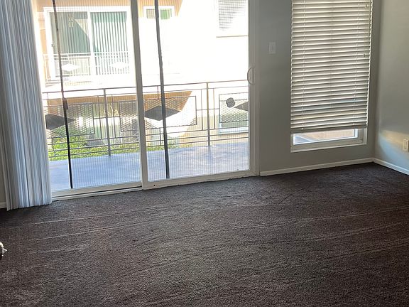 Living room showing private balcony
