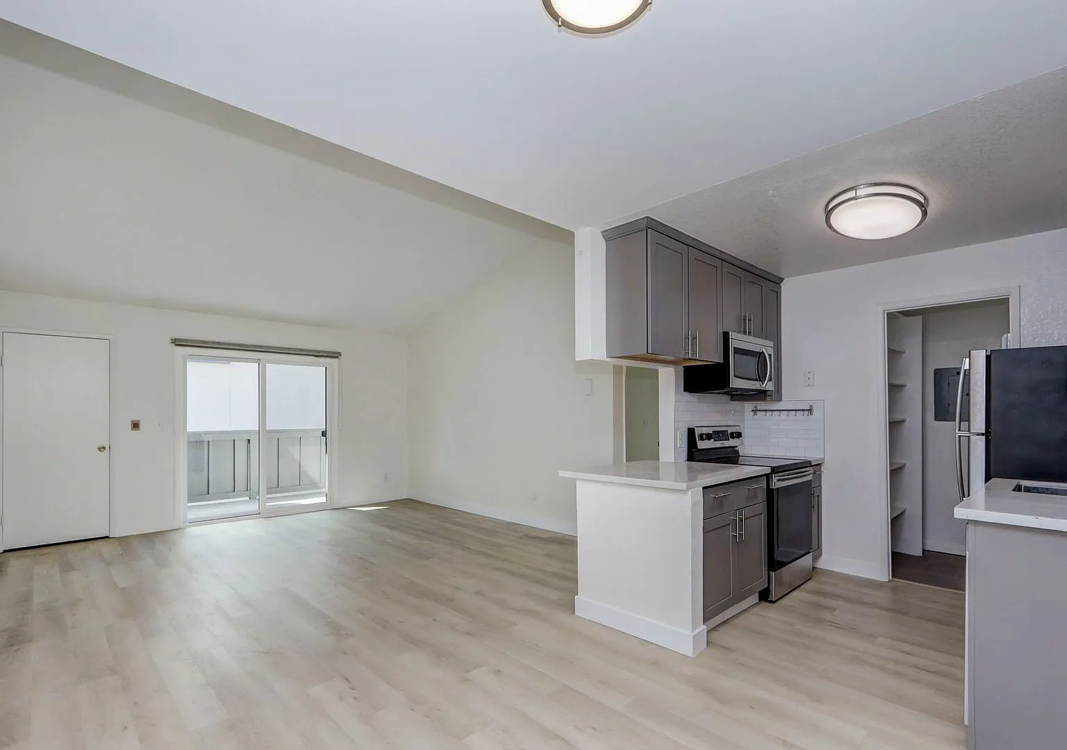 1BR/1BA Pet-Friendly Top-Floor Condo with Pool, In-Unit Laundry & 2 Parking Spaces | YouTube Tour — Photo 1