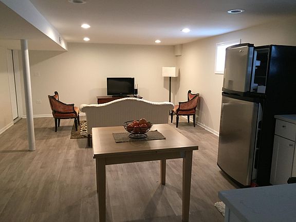 open concept kitchen and living room bedroom