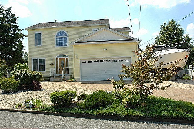 4 Years Young Center Hall Custom Contemporary Colonial with room for your boat