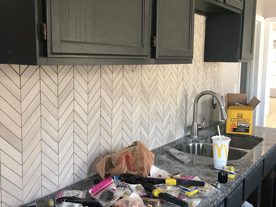 Brand new tiled kitchens. Hardware on cabinets to come