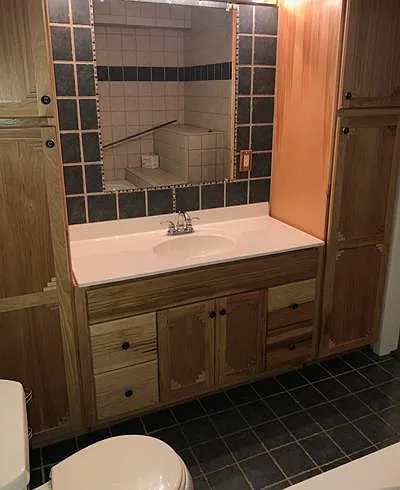 Basement bathroom with extra storage and jetted tub