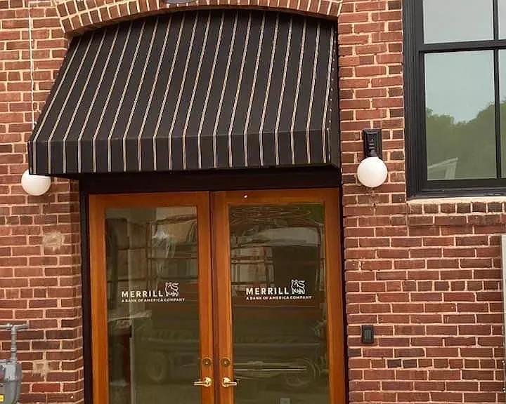 Rear entrance from alley and parking lot