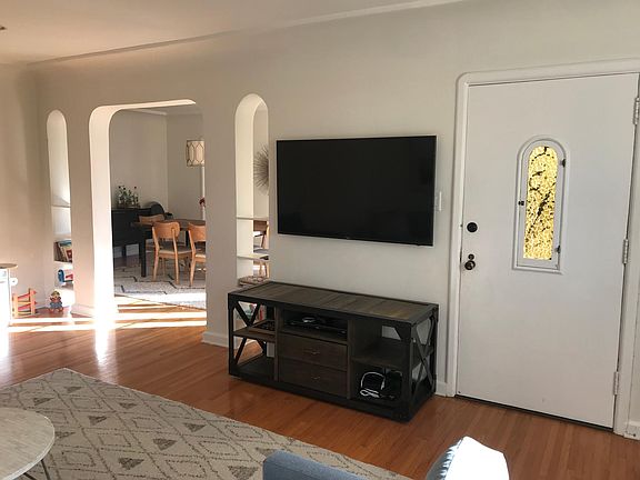 Beautiful arches lead into the dining room